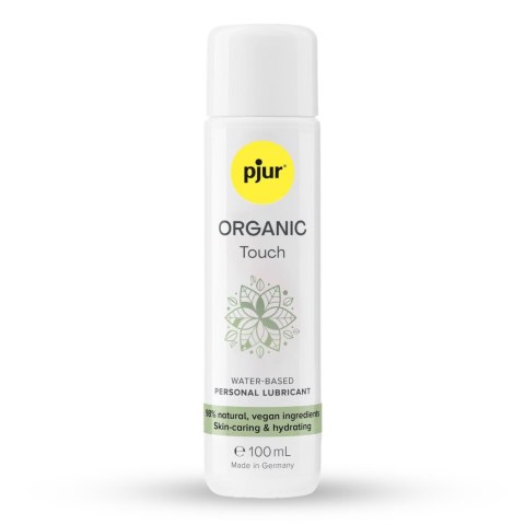 Elegancka butelka naturalnego, wegańskiego lubrykantu Pjur ORGANIC Touch 100 ml, na ciepłym, beżowym tle.
